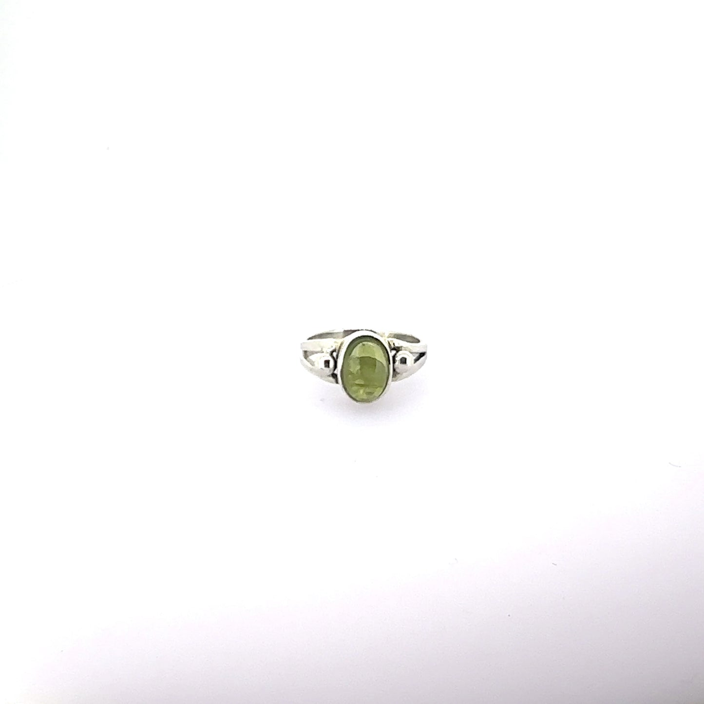 Silver peridot cabochon ring