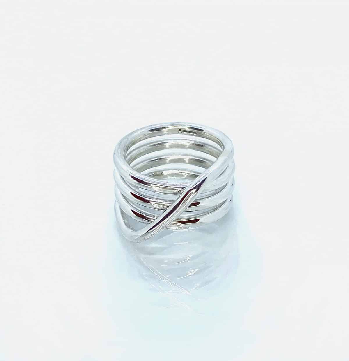 Medusa silver coil ring on white - front view