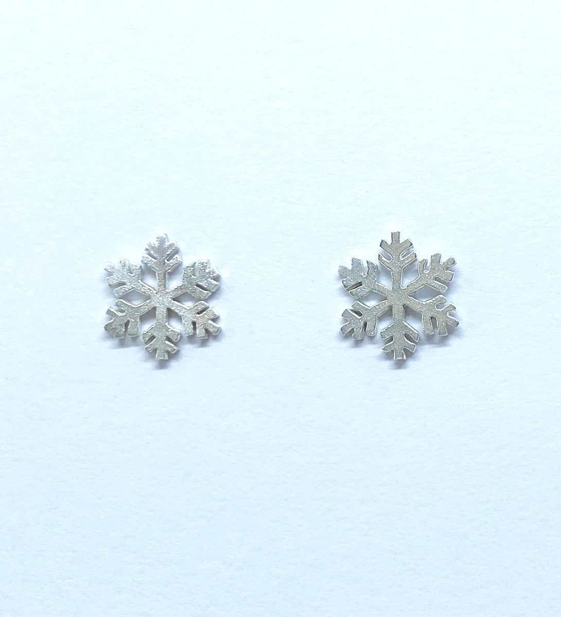 Silver snowflake studs